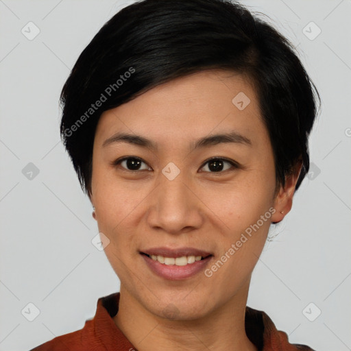 Joyful asian young-adult female with short  black hair and brown eyes