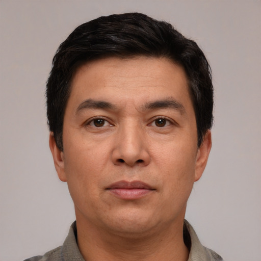 Neutral white young-adult male with short  black hair and brown eyes