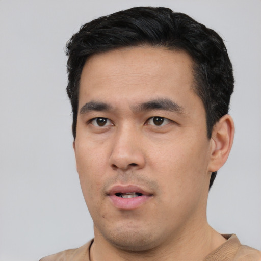 Neutral asian young-adult male with short  black hair and brown eyes
