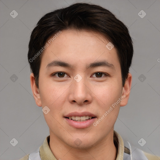 Joyful asian young-adult male with short  brown hair and brown eyes