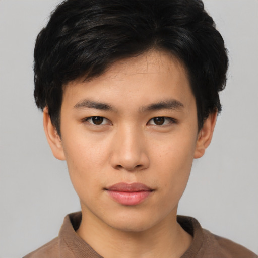 Neutral asian young-adult male with short  black hair and brown eyes