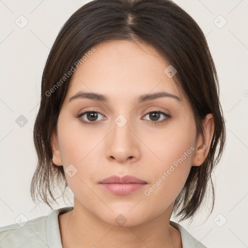 Neutral white young-adult female with medium  brown hair and brown eyes