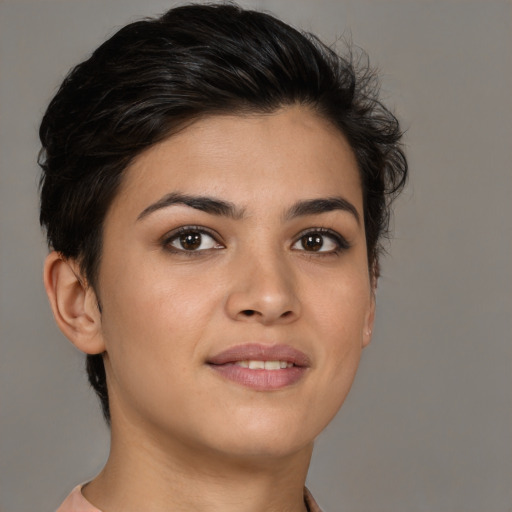 Joyful white young-adult female with short  brown hair and brown eyes