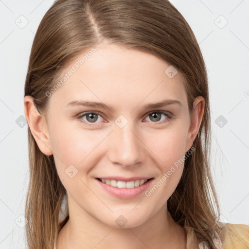 Joyful white young-adult female with long  brown hair and grey eyes