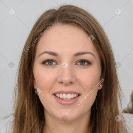 Joyful white young-adult female with long  brown hair and grey eyes