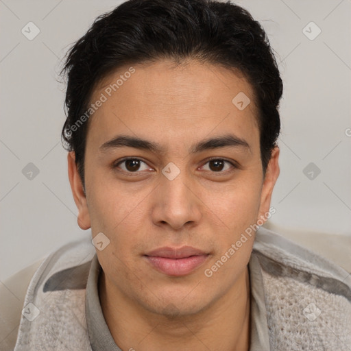 Joyful latino young-adult male with short  brown hair and brown eyes