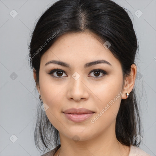 Joyful asian young-adult female with medium  brown hair and brown eyes