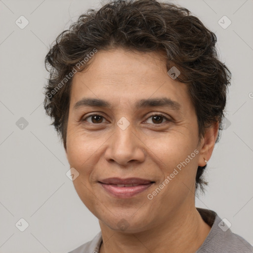 Joyful white adult female with short  brown hair and brown eyes