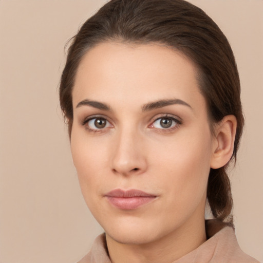 Neutral white young-adult female with medium  brown hair and brown eyes