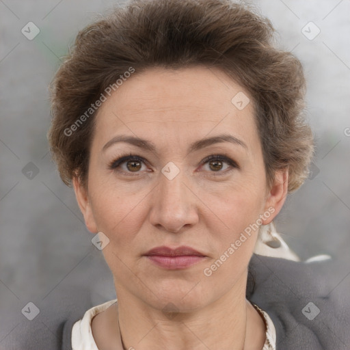 Joyful white adult female with short  brown hair and brown eyes
