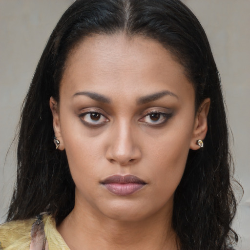 Neutral latino young-adult female with long  brown hair and brown eyes