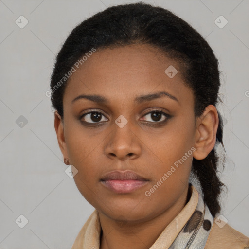 Neutral black young-adult female with short  black hair and brown eyes