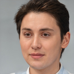 Joyful white adult female with short  brown hair and brown eyes