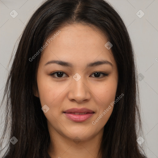 Joyful latino young-adult female with long  brown hair and brown eyes