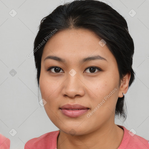 Joyful asian young-adult female with medium  black hair and brown eyes