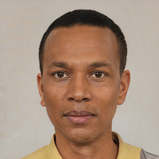 Neutral black young-adult male with short  black hair and brown eyes