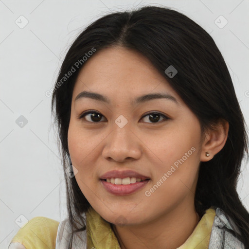 Joyful asian young-adult female with medium  brown hair and brown eyes