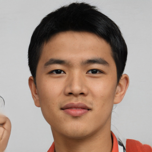Neutral asian young-adult male with short  brown hair and brown eyes