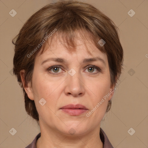 Joyful white adult female with medium  brown hair and grey eyes