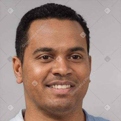 Joyful latino young-adult male with short  brown hair and brown eyes