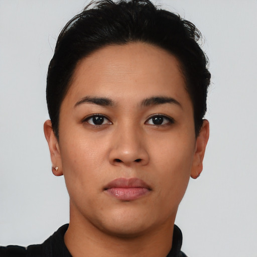 Neutral latino young-adult female with short  brown hair and brown eyes