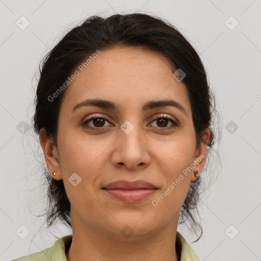 Joyful latino young-adult female with medium  brown hair and brown eyes