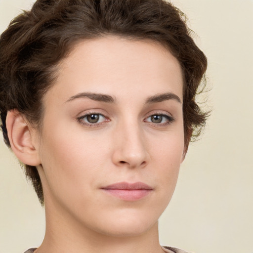 Neutral white young-adult female with short  brown hair and brown eyes