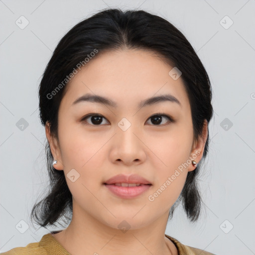 Joyful asian young-adult female with medium  black hair and brown eyes