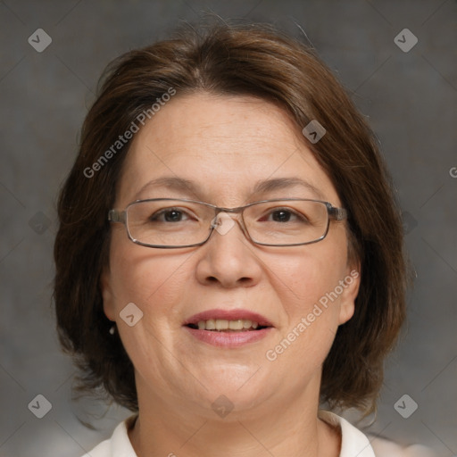 Joyful white adult female with medium  brown hair and brown eyes