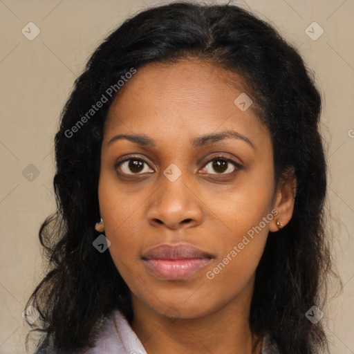 Joyful black young-adult female with long  black hair and brown eyes