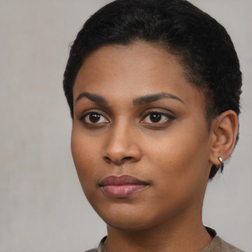 Neutral black young-adult female with short  black hair and brown eyes
