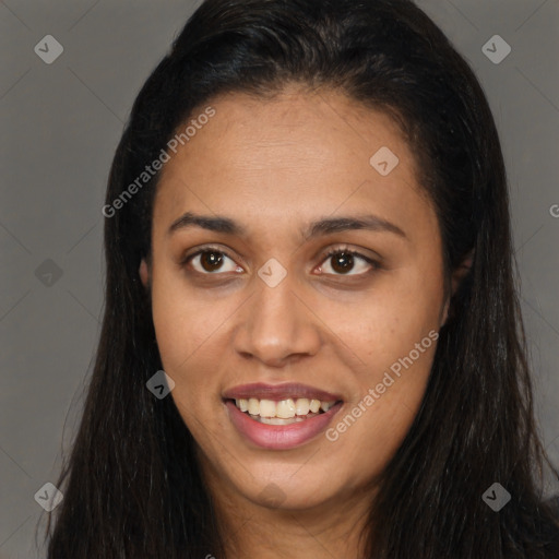 Joyful latino young-adult female with long  brown hair and brown eyes