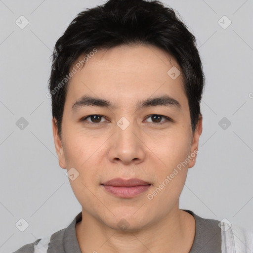 Joyful white young-adult male with short  black hair and brown eyes