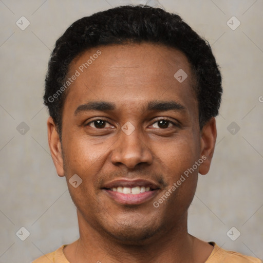 Joyful latino young-adult male with short  black hair and brown eyes