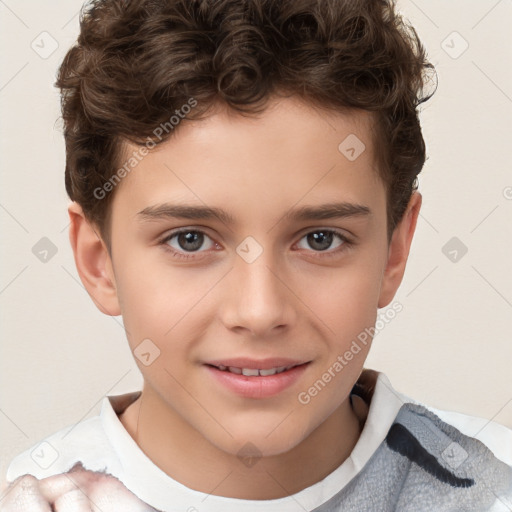 Joyful white child male with short  brown hair and brown eyes