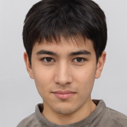 Neutral asian young-adult male with short  brown hair and brown eyes