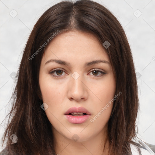 Neutral white young-adult female with long  brown hair and brown eyes