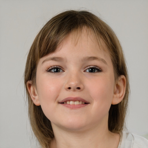 Joyful white child female with medium  brown hair and brown eyes