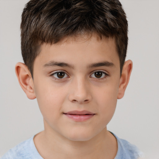 Joyful white child male with short  brown hair and brown eyes