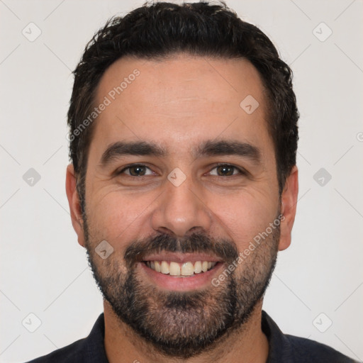 Joyful white young-adult male with short  black hair and brown eyes