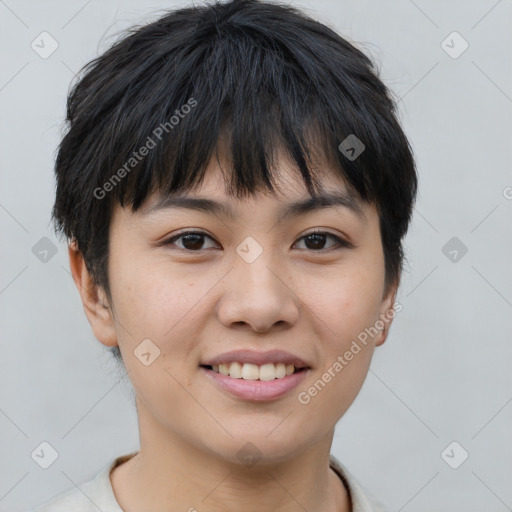 Joyful asian young-adult female with short  brown hair and brown eyes