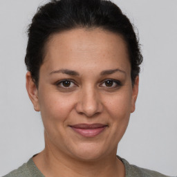 Joyful white adult female with short  brown hair and brown eyes