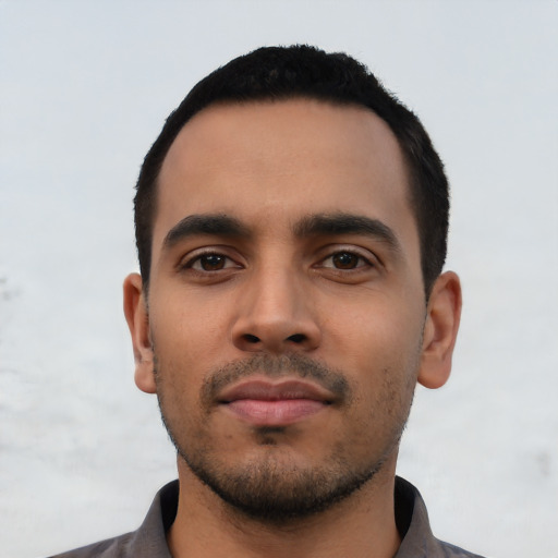 Neutral latino young-adult male with short  black hair and brown eyes