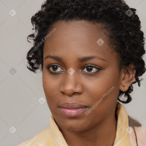 Neutral black young-adult female with short  brown hair and brown eyes