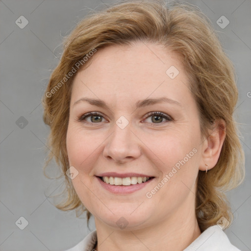 Joyful white young-adult female with medium  brown hair and blue eyes