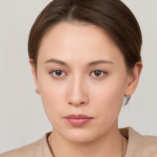 Neutral white young-adult female with short  brown hair and brown eyes