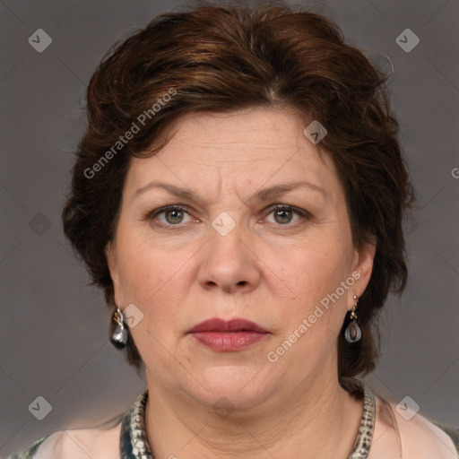 Joyful white adult female with medium  brown hair and grey eyes