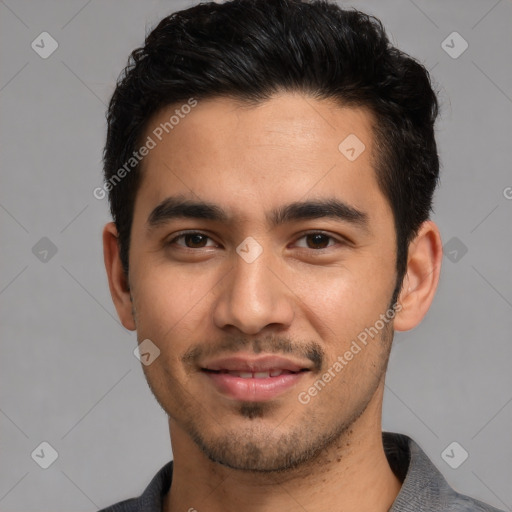 Joyful white young-adult male with short  black hair and brown eyes