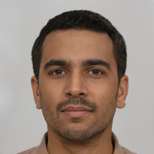 Neutral latino young-adult male with short  black hair and brown eyes