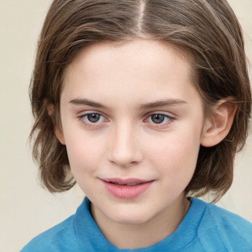 Joyful white child female with medium  brown hair and brown eyes